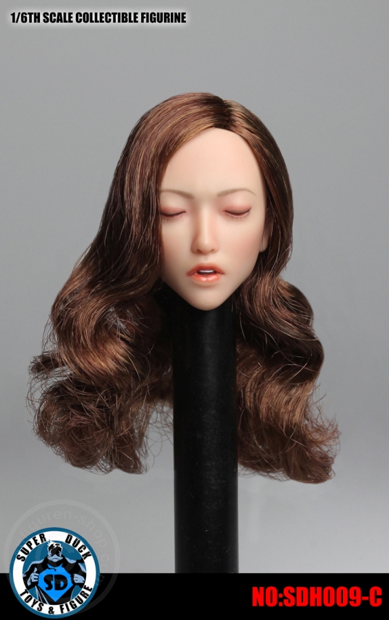 Female Head - closed Eyes - brown curly Hair