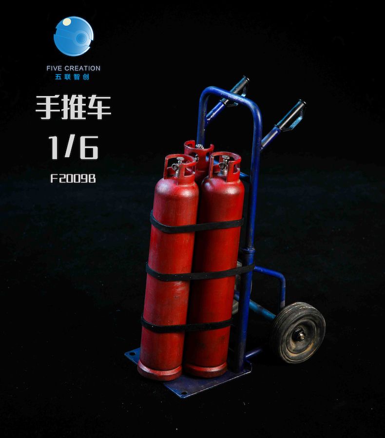 Hand Truck with 3 red Gas Bottles