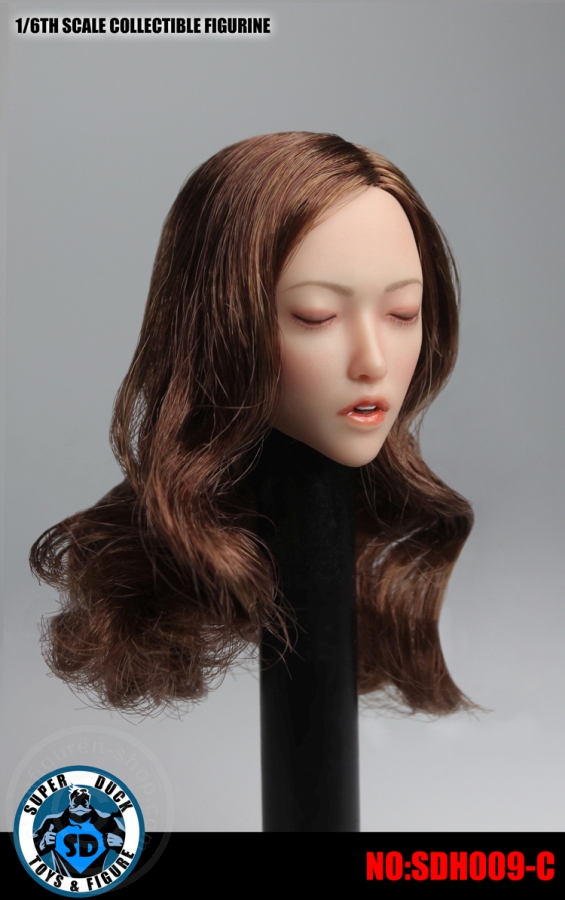 Female Head - closed Eyes - brown curly Hair