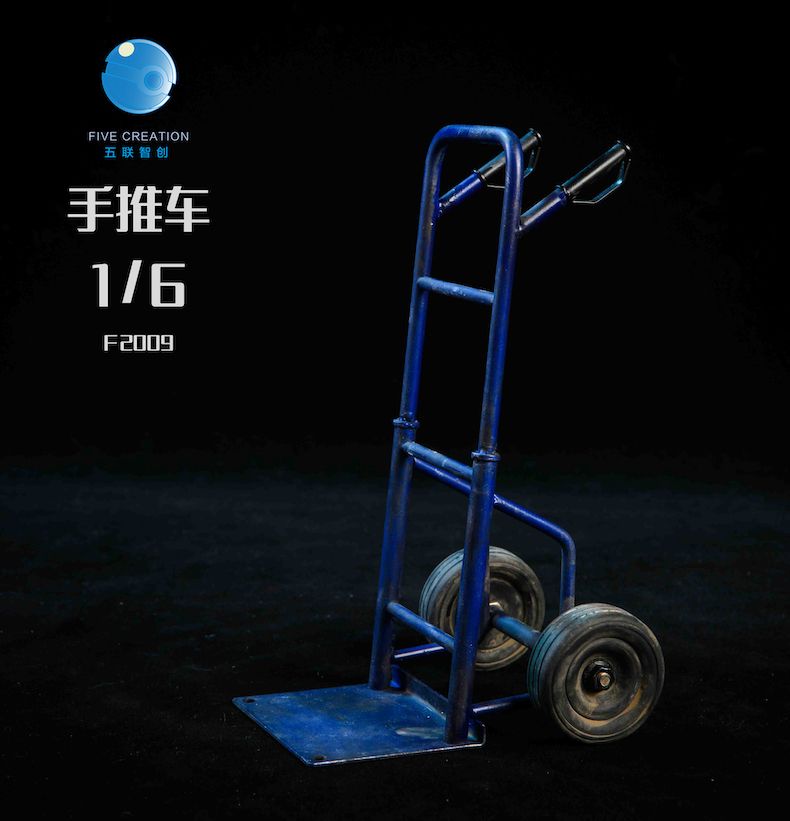 Hand Truck with 3 red Gas Bottles